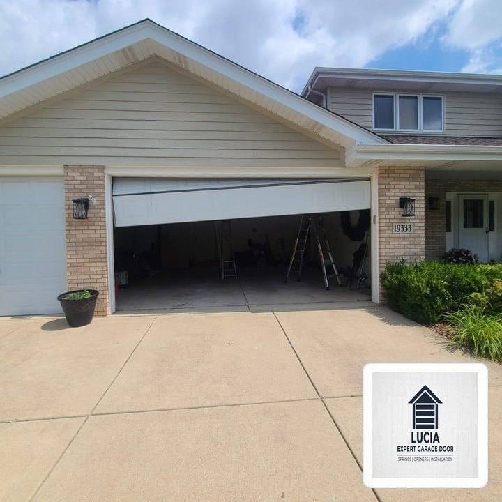 Off-Track Garage Door Emergency Realignment & Laser Calibration in Bedford, TX